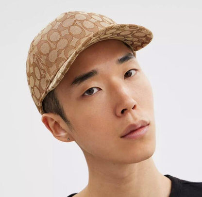 GORRA COACH SIGNATURE DORADA